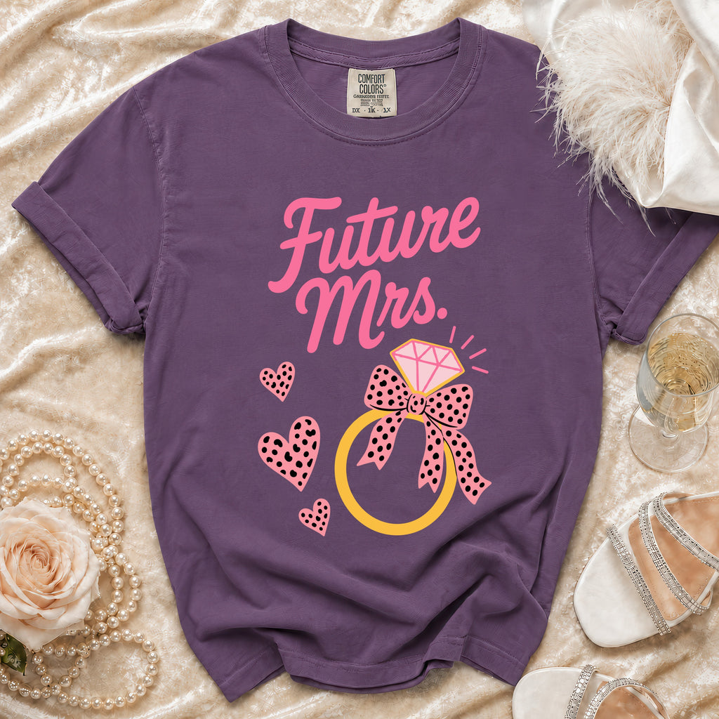 Purple t-shirt with "Future Mrs." text, diamond ring, and pink hearts.