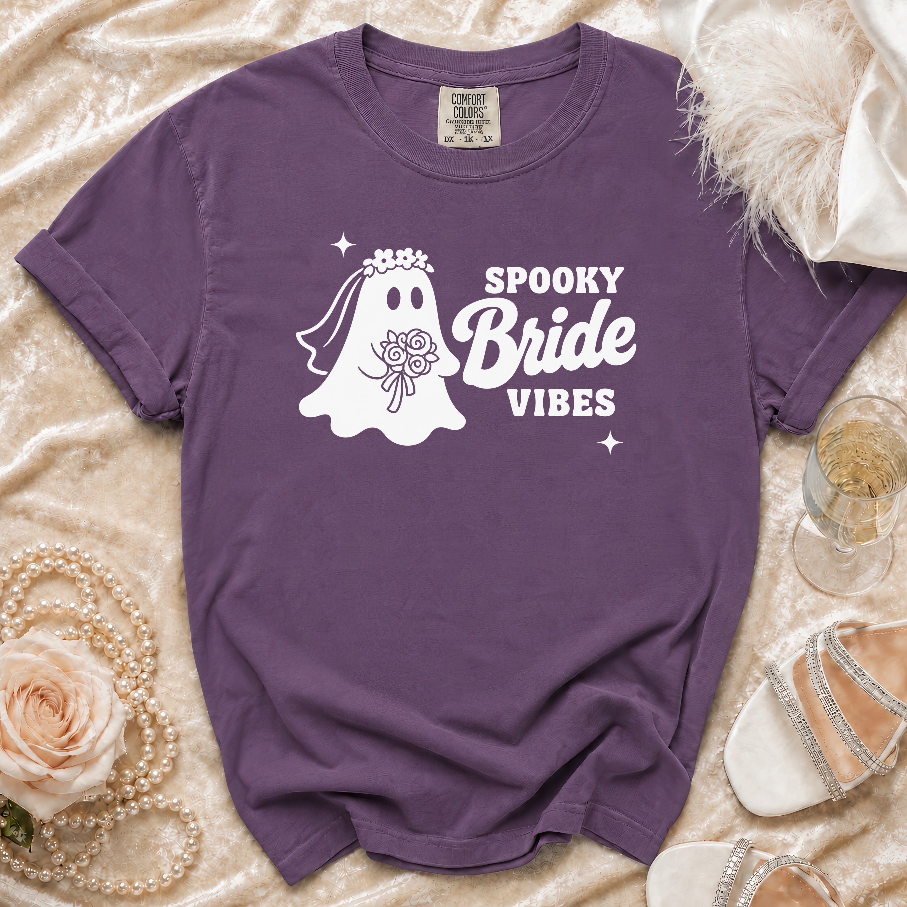 Purple t-shirt with white ghost bride graphic reading "Spooky Bride Vibes."