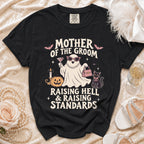 Black t-shirt with "Mother of the Groom Raising Hell & Raising Standards" text and graphics.