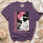 Purple t-shirt with Bride of Frankenstein graphic and "Happily Never After" text.