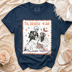 Navy t-shirt with "Til Death" skeleton bride and groom graphic in a stamp design.