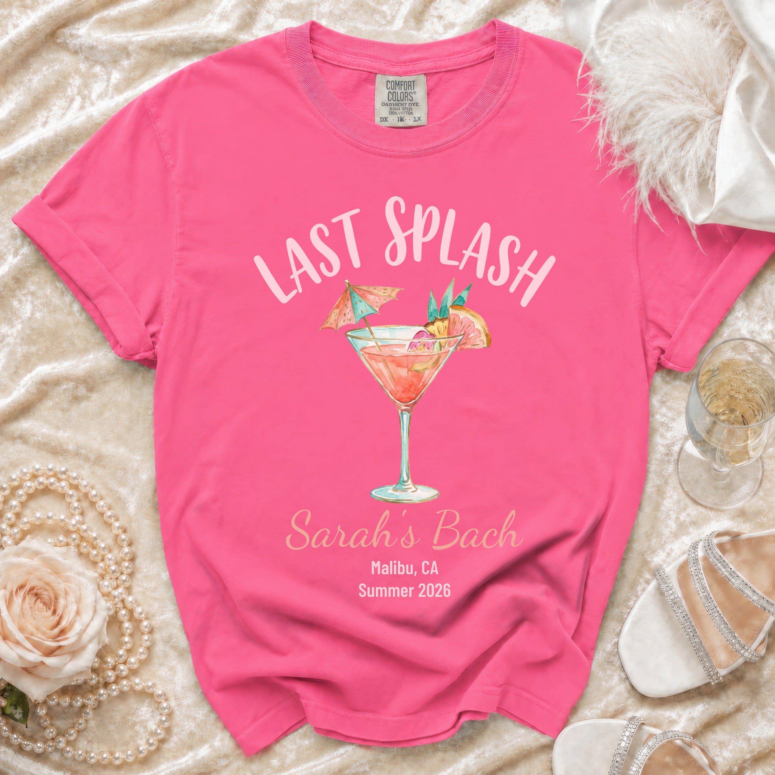 Pink t-shirt with "Last Splash Sarah's Bach Malibu, CA Summer 2026" and cocktail graphic.