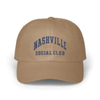 Tan baseball cap featuring blue embroidered text reading NASHVILLE SOCIAL CLUB on the front.