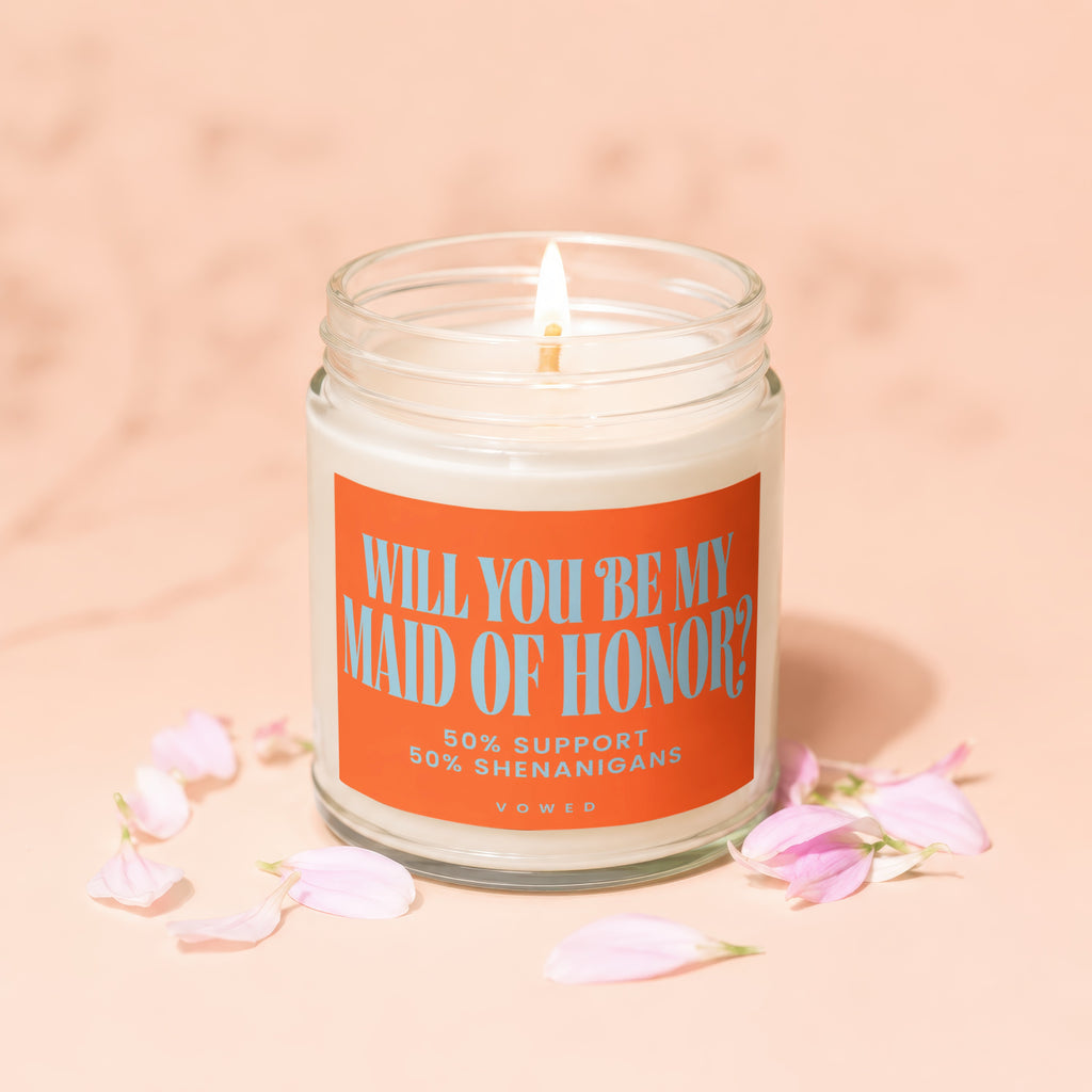 Candle with text "Will you be my Maid of Honor? 50% support 50% shenanigans".
