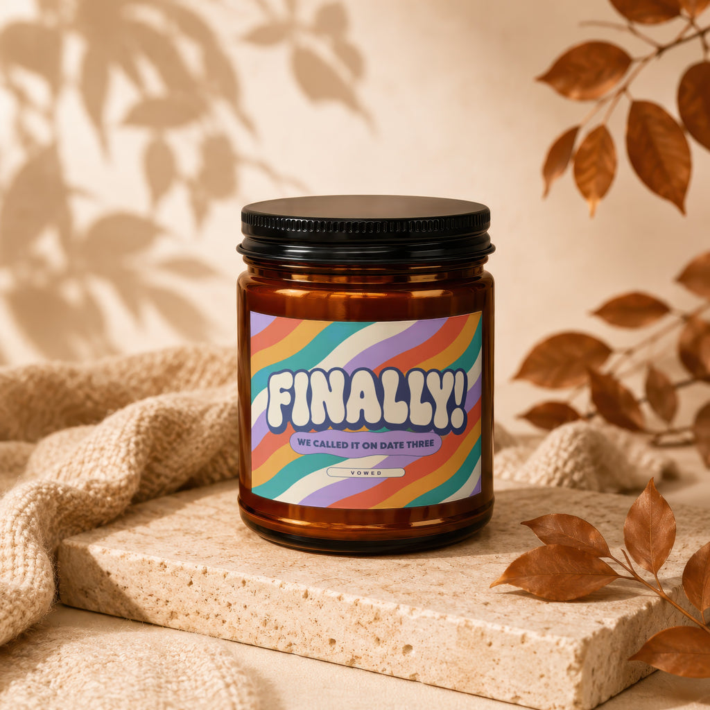 Brown candle with "FINALLY! WE CALLED IT ON DATE THREE VOWED" text.