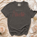 Gray Comfort Colors t-shirt with "Happily Ever Afterlife" text and graphic.