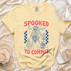 Yellow t-shirt with "SPOOKED TO COMMIT" text and skeleton bride graphic.