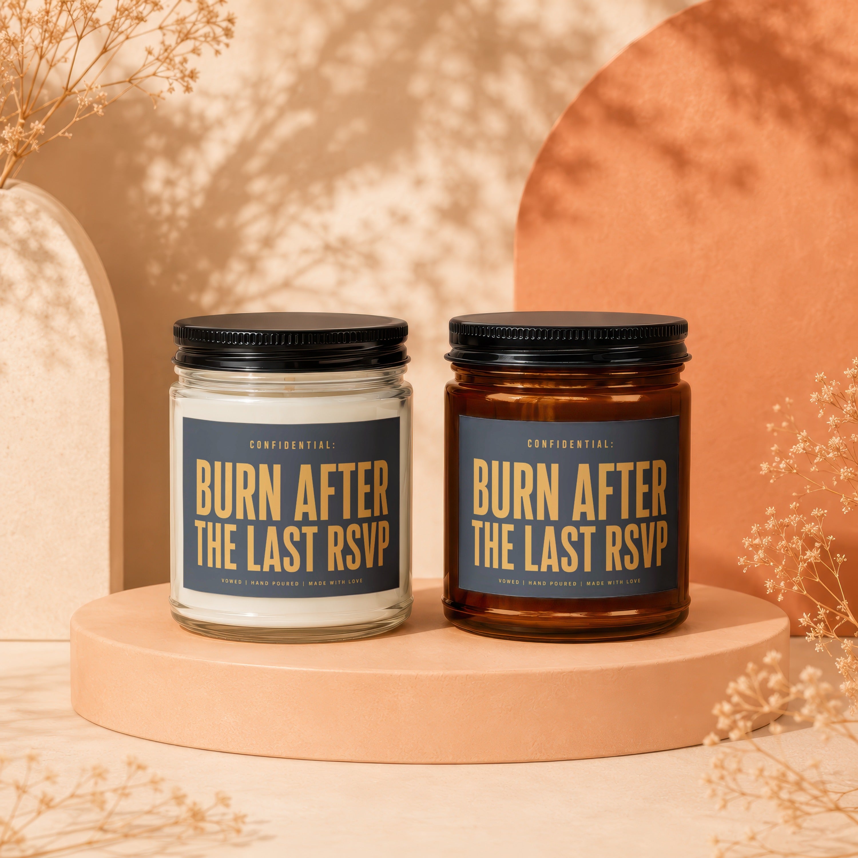 Two candles labeled "Burn After The Last RSVP" sit on display pedestals.