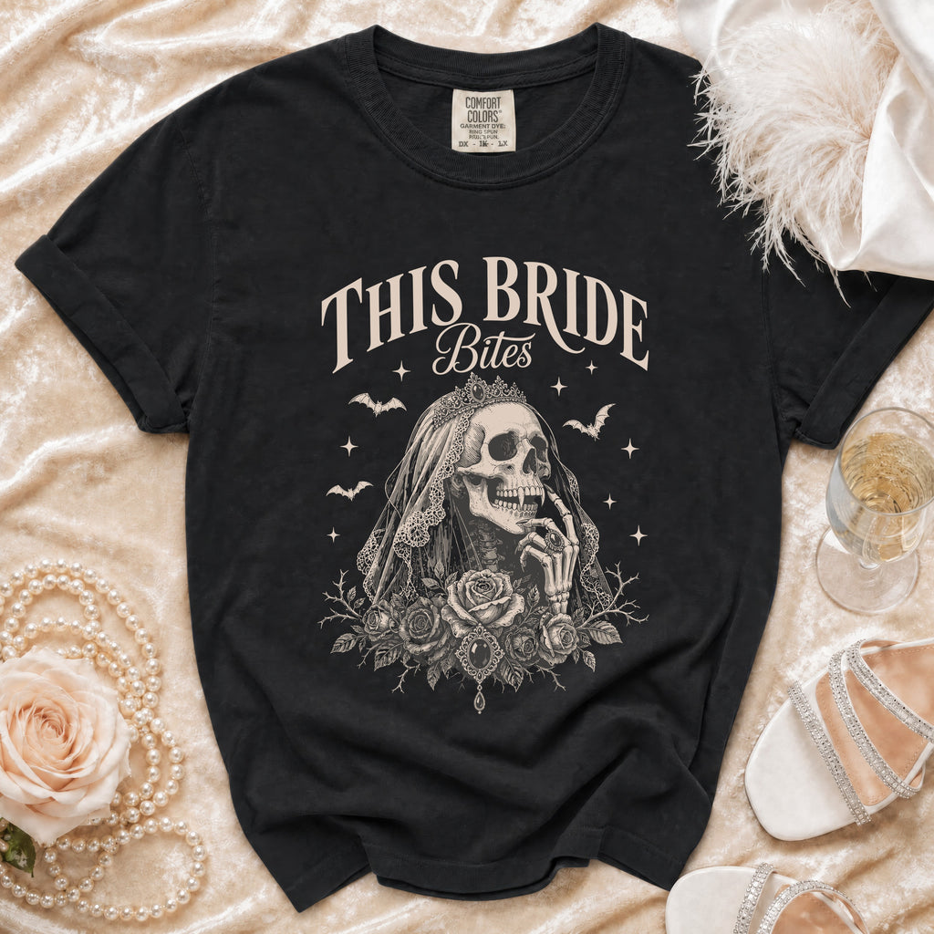 Black t-shirt with "This Bride Bites" text and skeleton bride graphic.