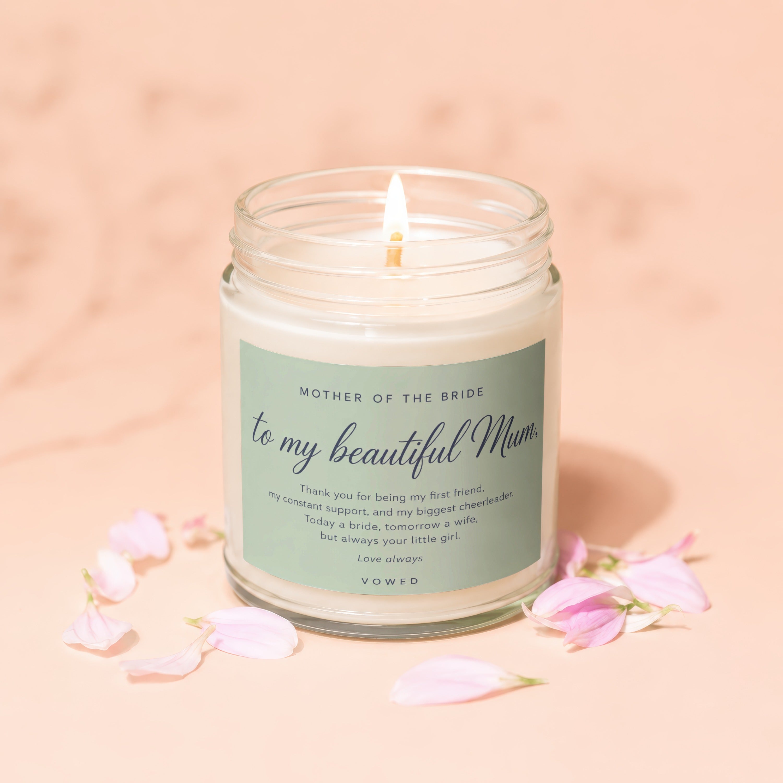 Lit candle in a jar with a "Mother of the Bride To My Beautiful Mum" label.