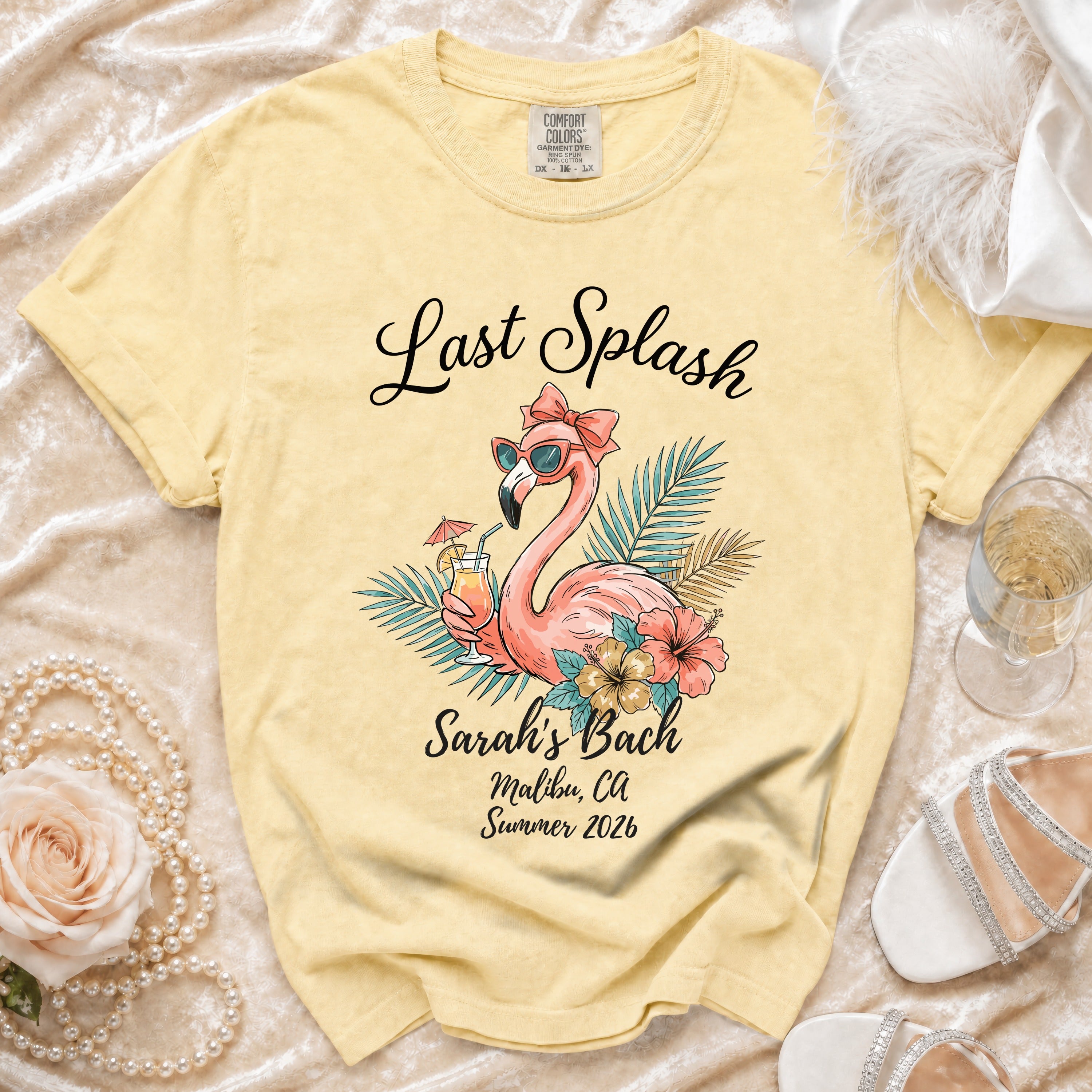 Yellow t-shirt with "Last Splash Sarah's Bach Malibu, Ca Summer 2026" and flamingo graphic.