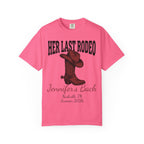 Pink t-shirt with "Her Last Rodeo" and cowboy boot graphic.