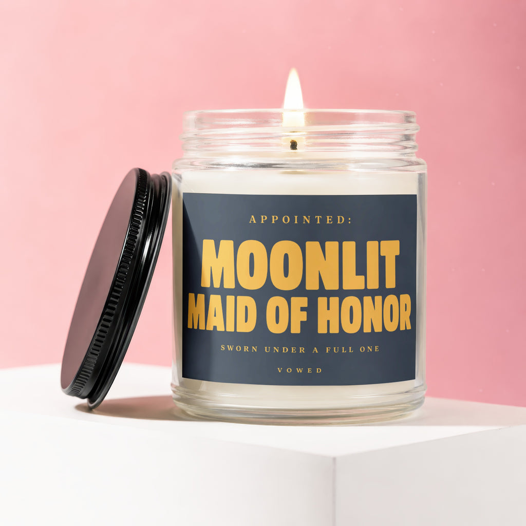 Candle labeled "Appointed: Moonlit Maid of Honor" with lid removed