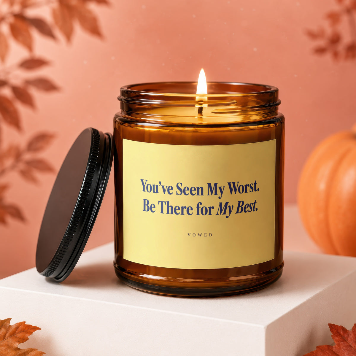 Amber candle with lid off, featuring text "You've Seen My Worst. Be There for My Best."