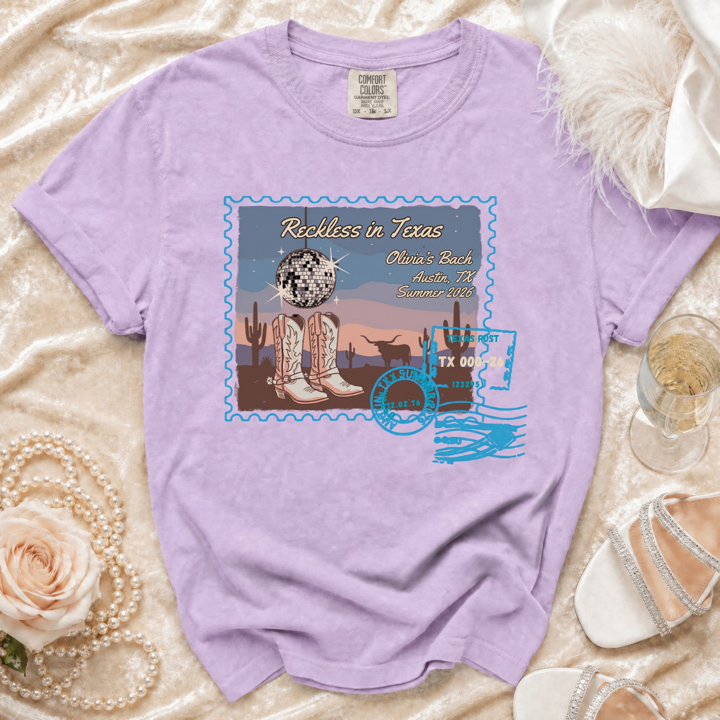 T-shirt with Texas postcard design, featuring boots, disco ball, and text.