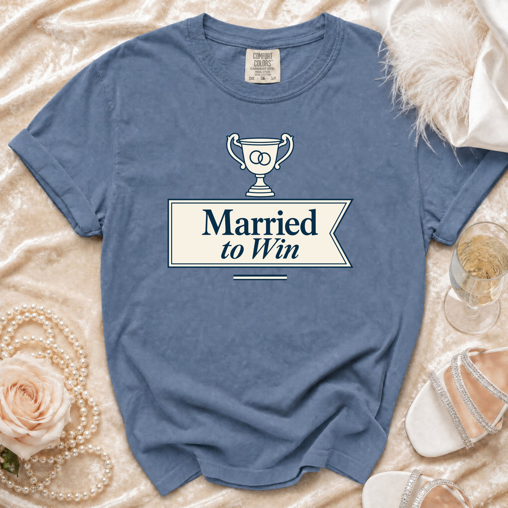Blue t-shirt with a trophy graphic and text "Married to Win".