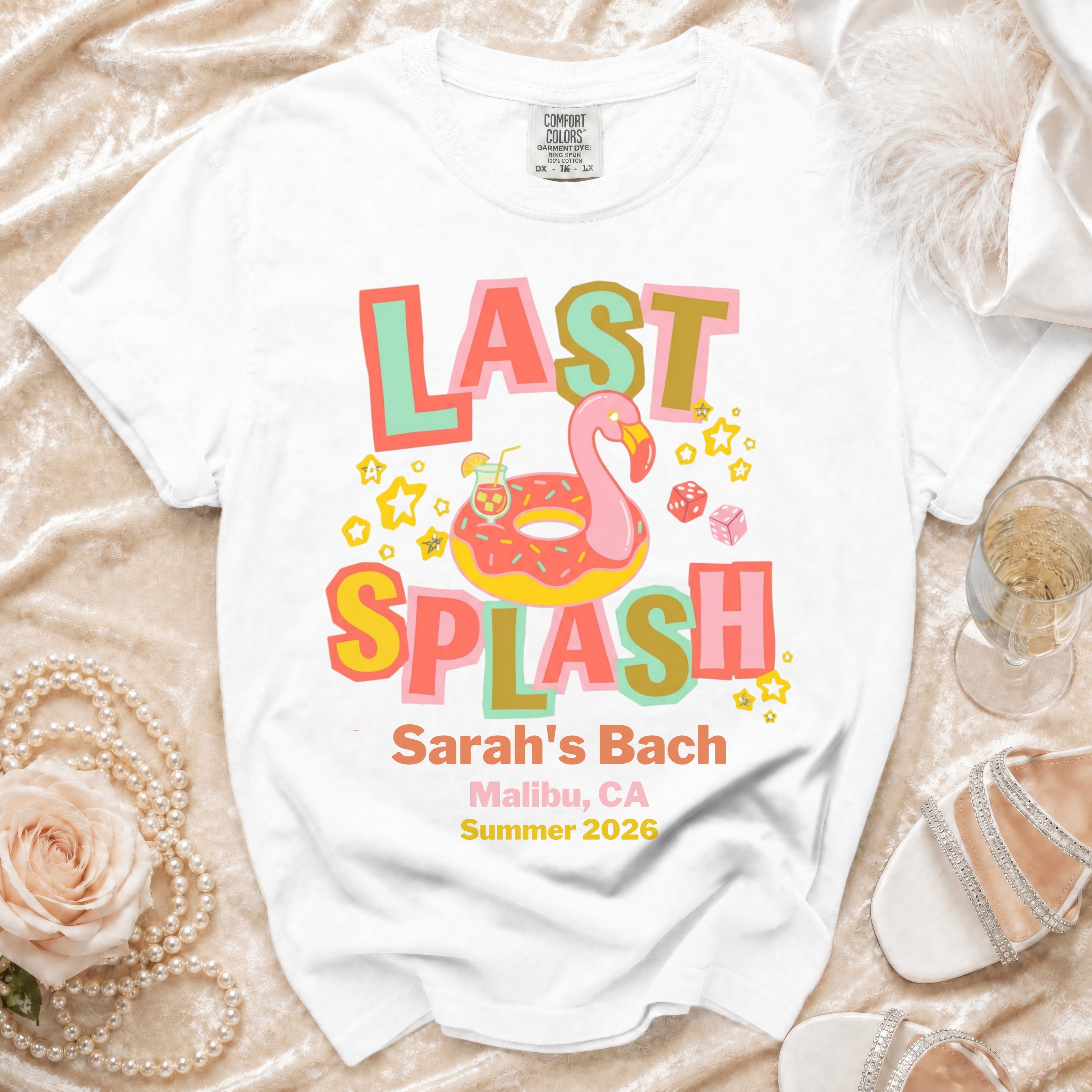 White t-shirt with "Last Splash Sarah's Bach Malibu 2026" text and flamingo float.