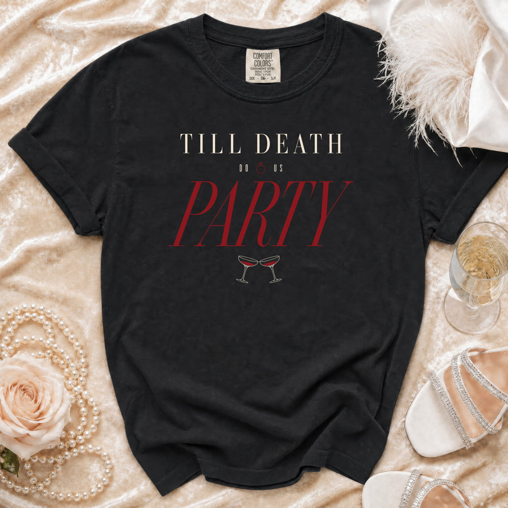 Black t-shirt with "Till Death Do Us Party" text and champagne glasses.