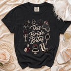 Black t-shirt with "This Bride Bites" and gothic wedding graphics.