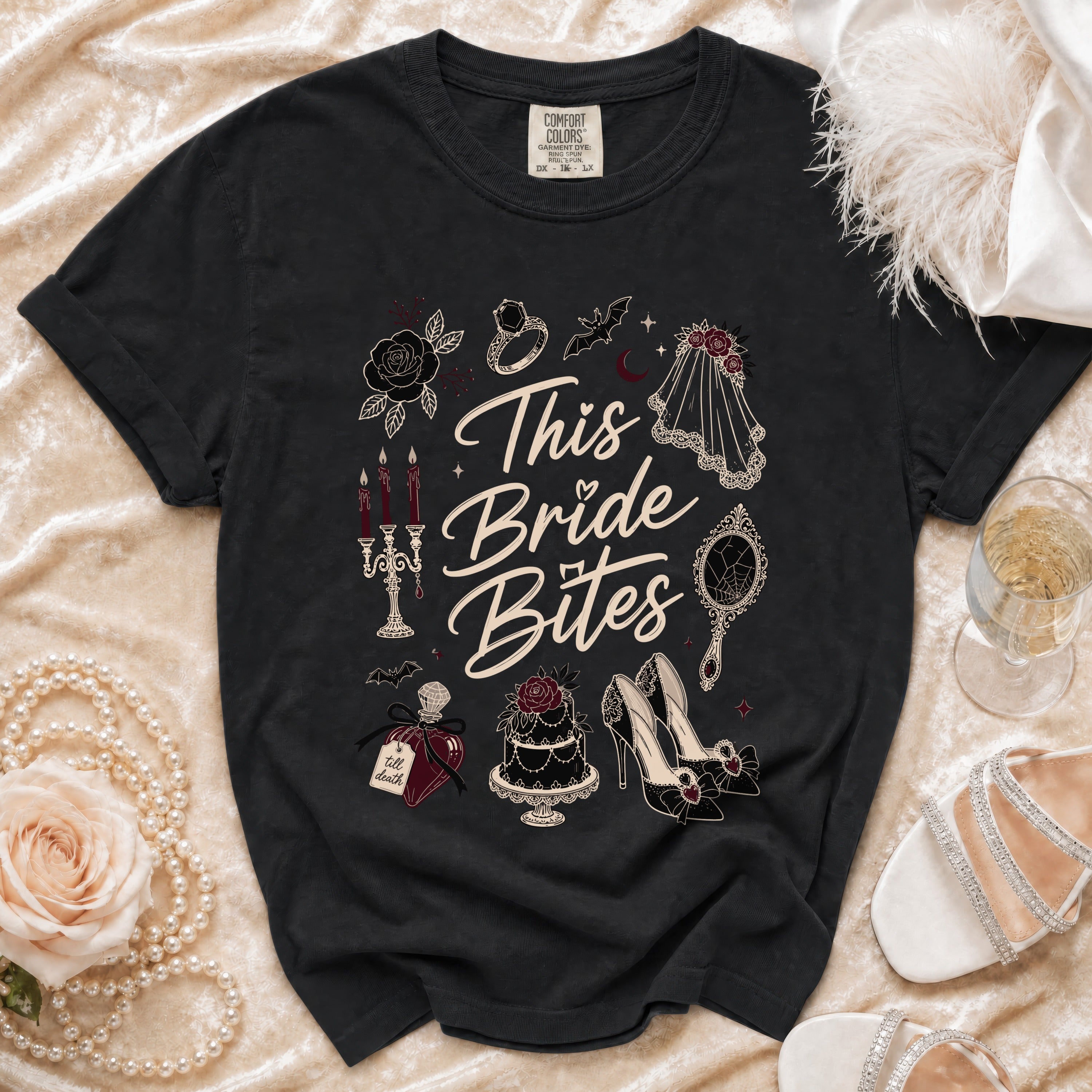 Black t-shirt with "This Bride Bites" and gothic wedding graphics.