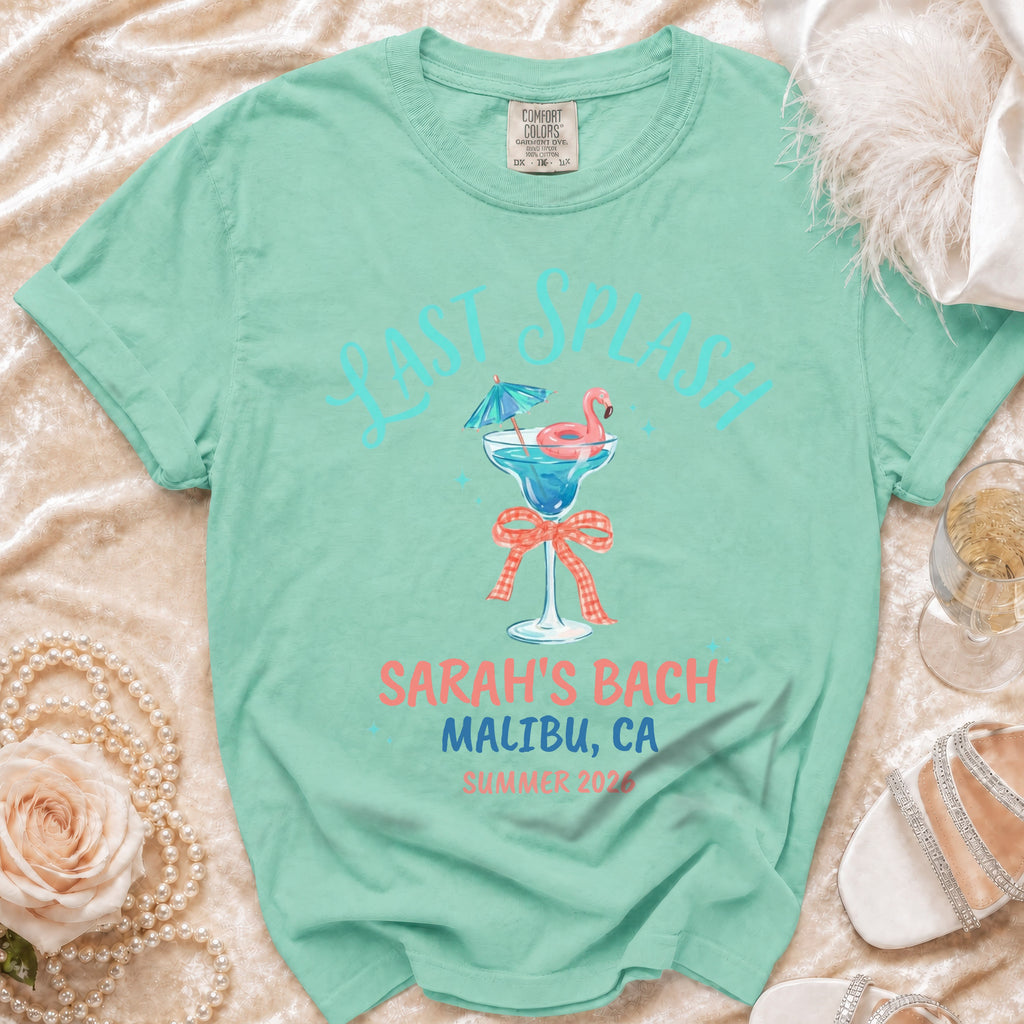 Mint green t-shirt with "Last Splash" and flamingo cocktail graphic.