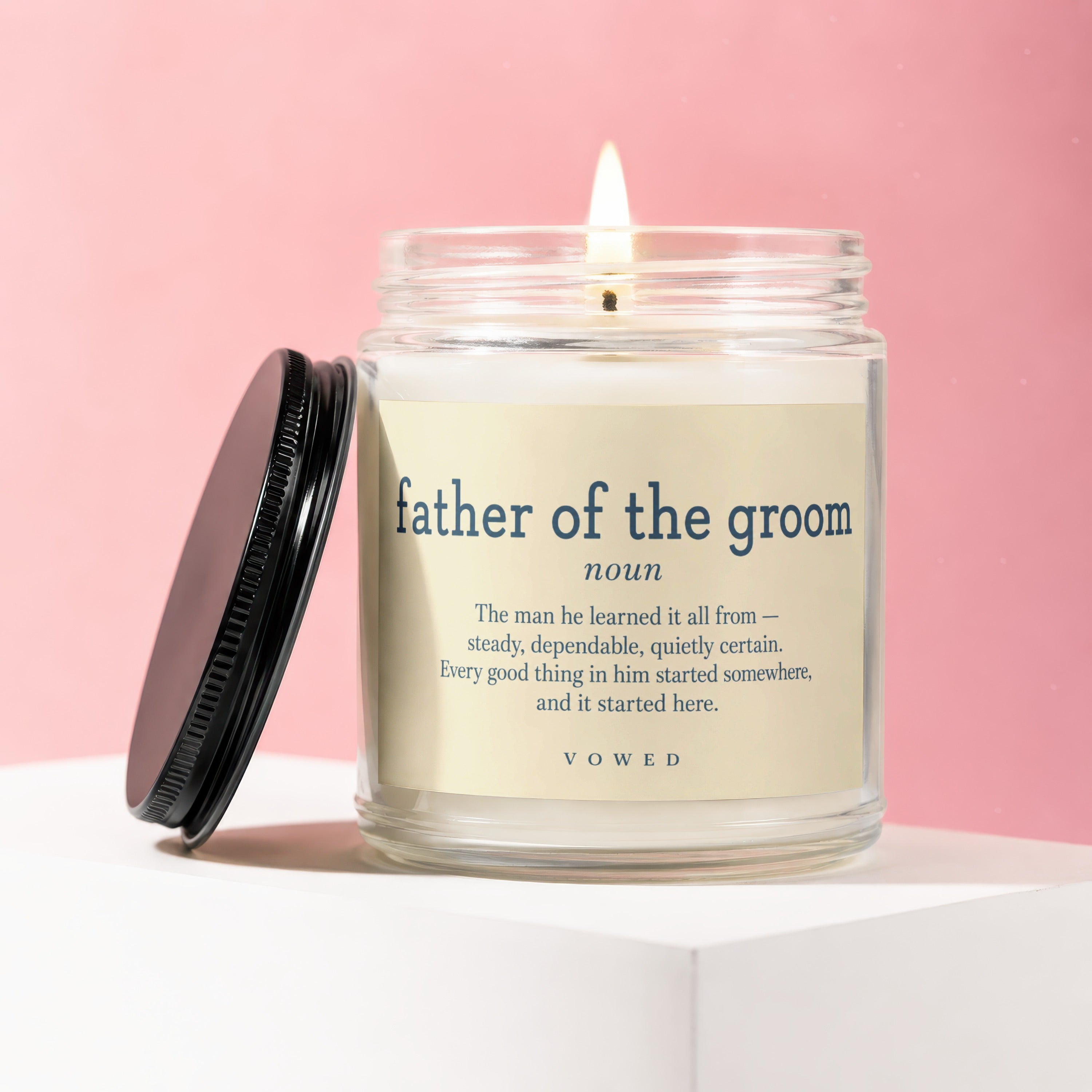 Glass candle with "father of the groom noun" poem, lid off.
