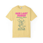 Yellow t-shirt with "Her Last Rodeo Jennifer's Bach Nashville, TN Summer 2026" and cowboy boots graphic.
