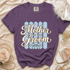 Purple t-shirt with "Mother of the Groom" text and a bow graphic.