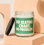 Candle with green label reading "NO SEATING CHART. NO PROBLEM."