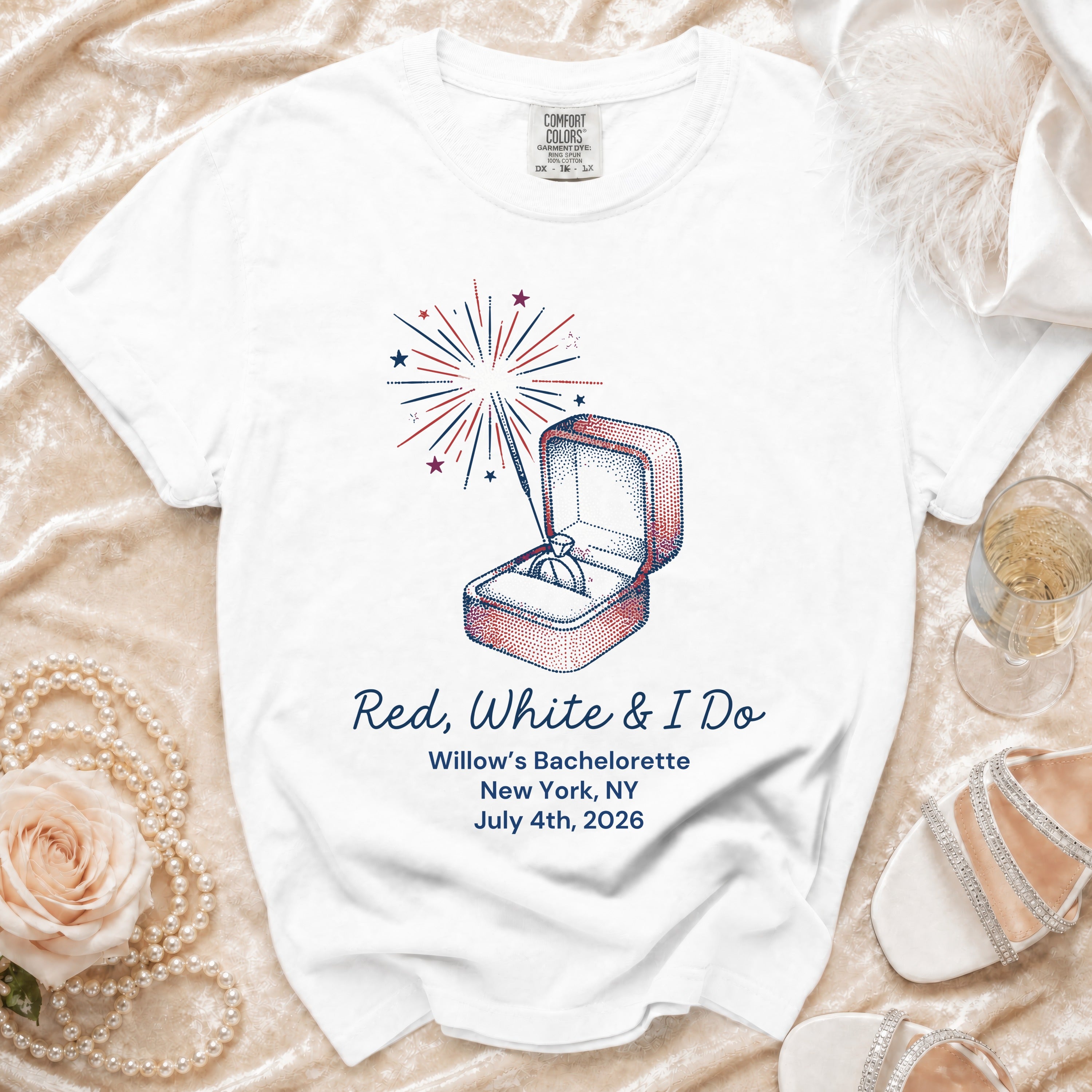 White t-shirt with "Red, White & I Do Willow's Bachelorette" text and engagement ring.