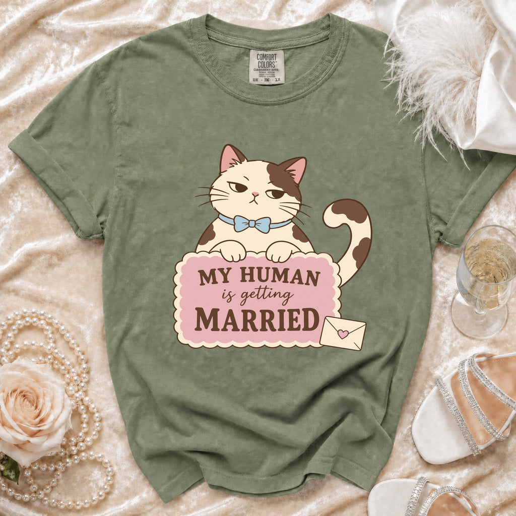 Green t-shirt with cartoon cat graphic and text "My Human is Getting Married."