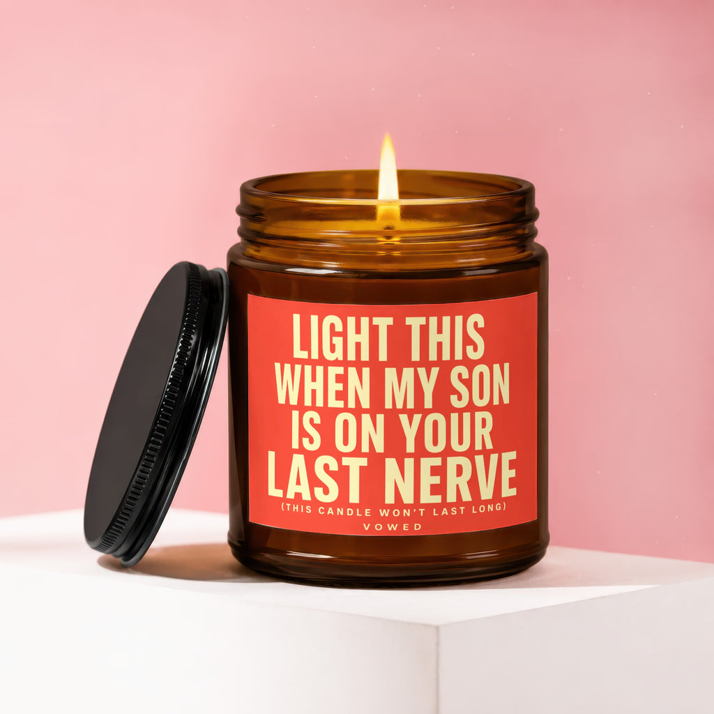 Amber jar candle with red label saying "Light this when my son is on your last nerve."
