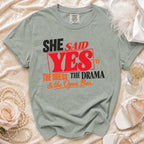 Light green t-shirt reading "She Said Yes to The Dress, The Drama & the Open Bar."