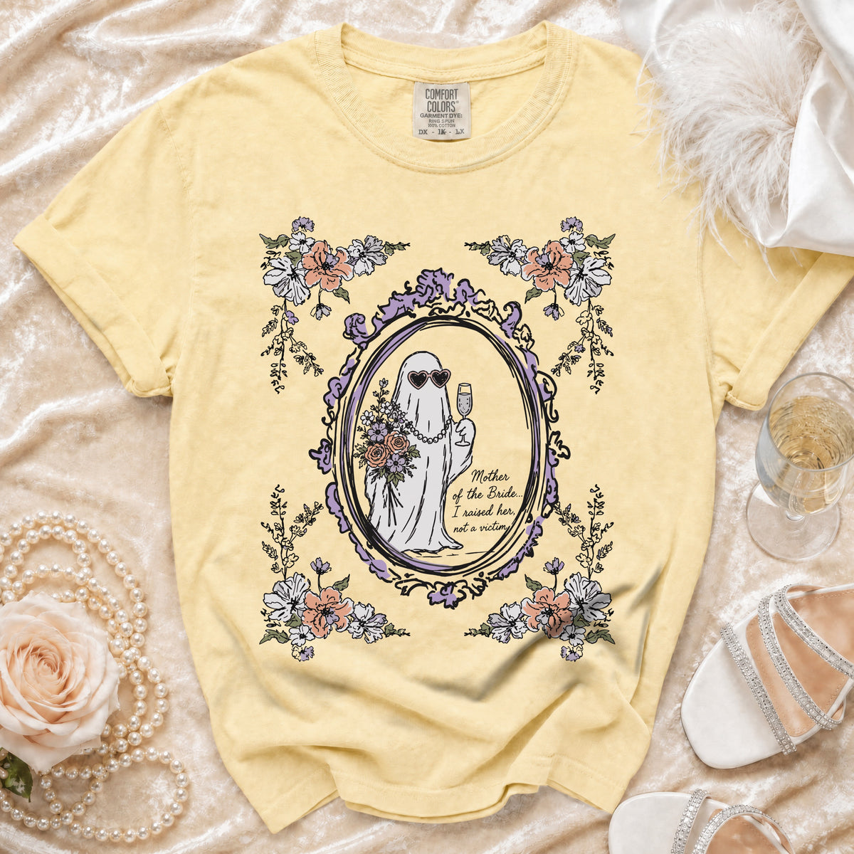 Yellow t-shirt with ghost graphic and text "Mother of the Bride... I raised her, not a victim."