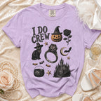 Purple t-shirt with "I DO CREW" text and Halloween-themed graphics.