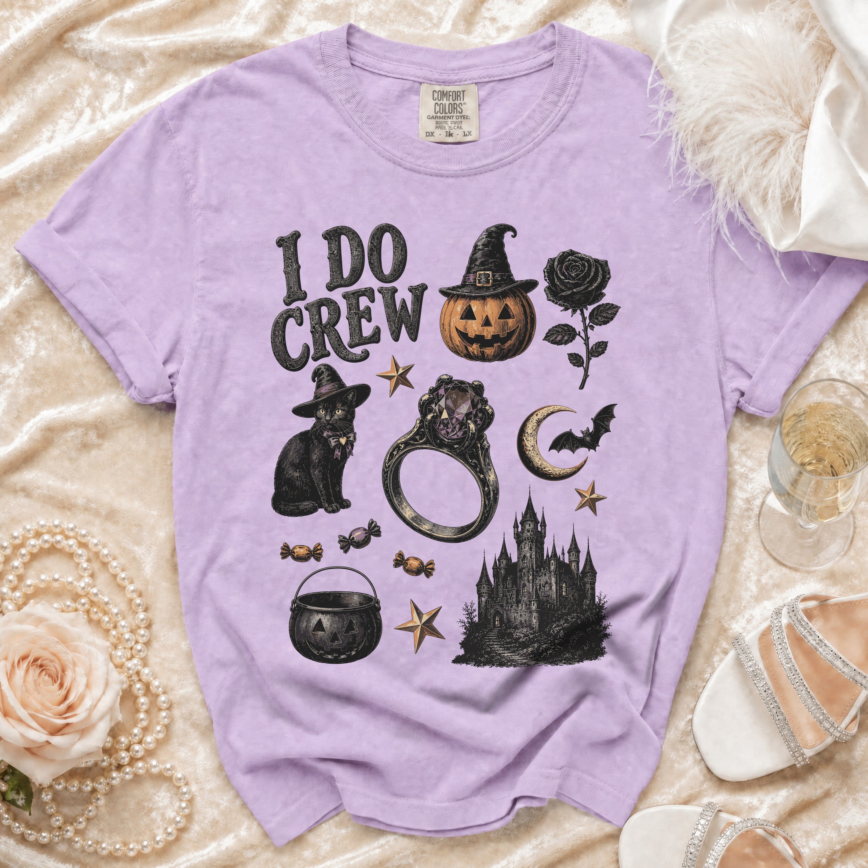 Purple t-shirt with "I DO CREW" text and Halloween-themed graphics.