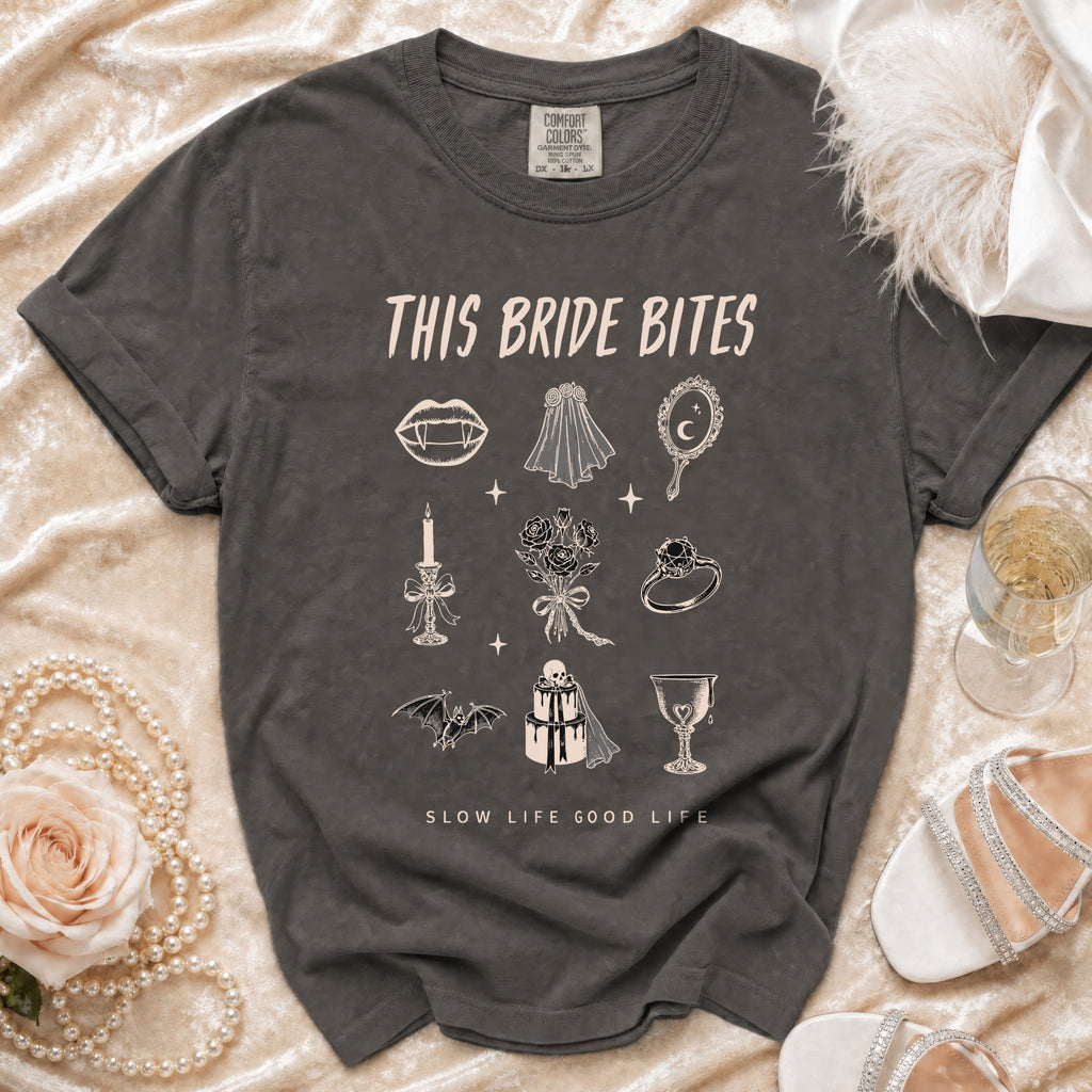 Dark grey t-shirt with "This Bride Bites" and gothic bridal illustrations.