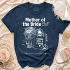 Navy blue t-shirt with "Mother of the Bride Club" graphic featuring skull, roses, and pumpkin.