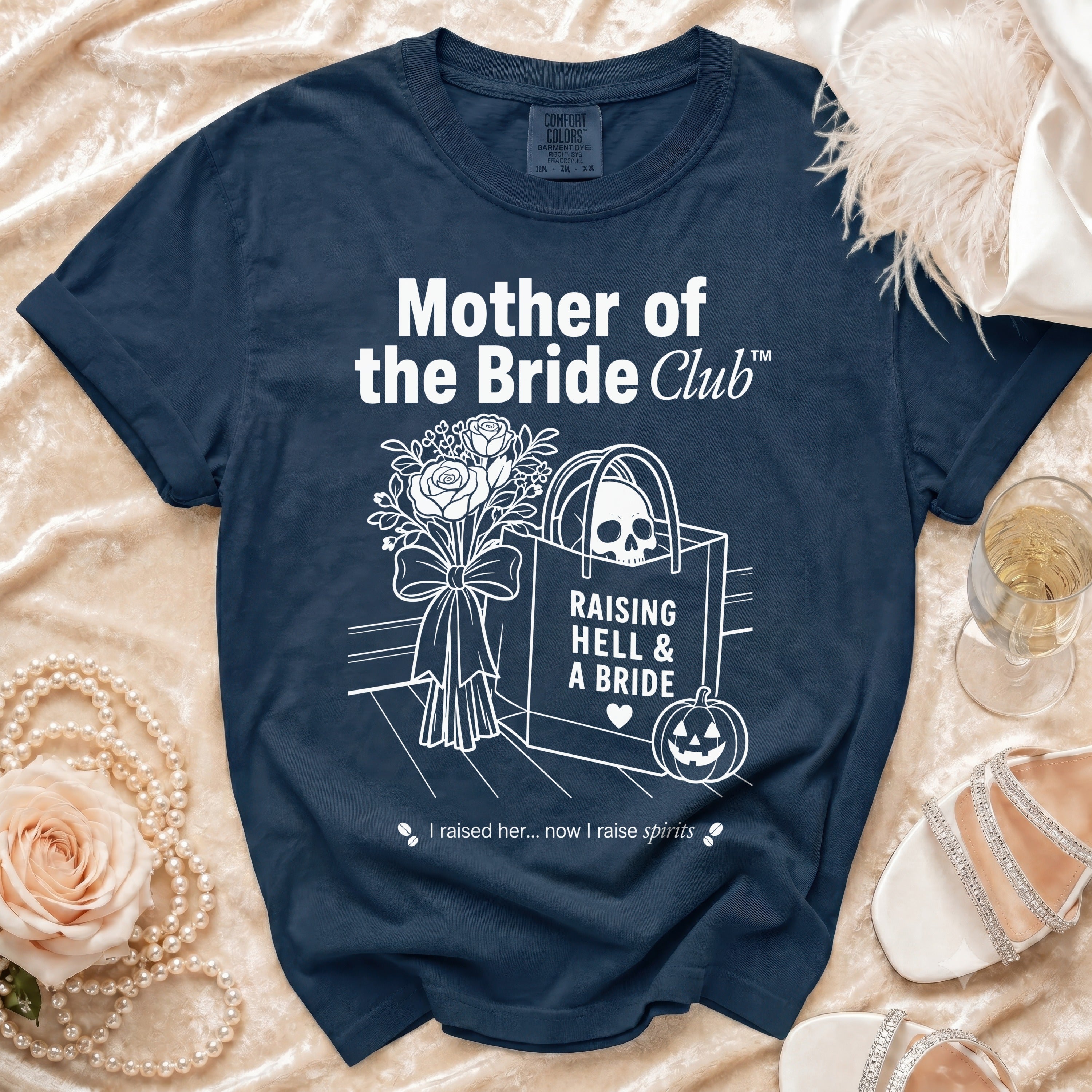 Navy blue t-shirt with "Mother of the Bride Club" graphic featuring skull, roses, and pumpkin.