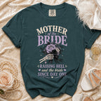 Teal shirt with "Mother of the Bride Raising Hell and the bride since day one" text.