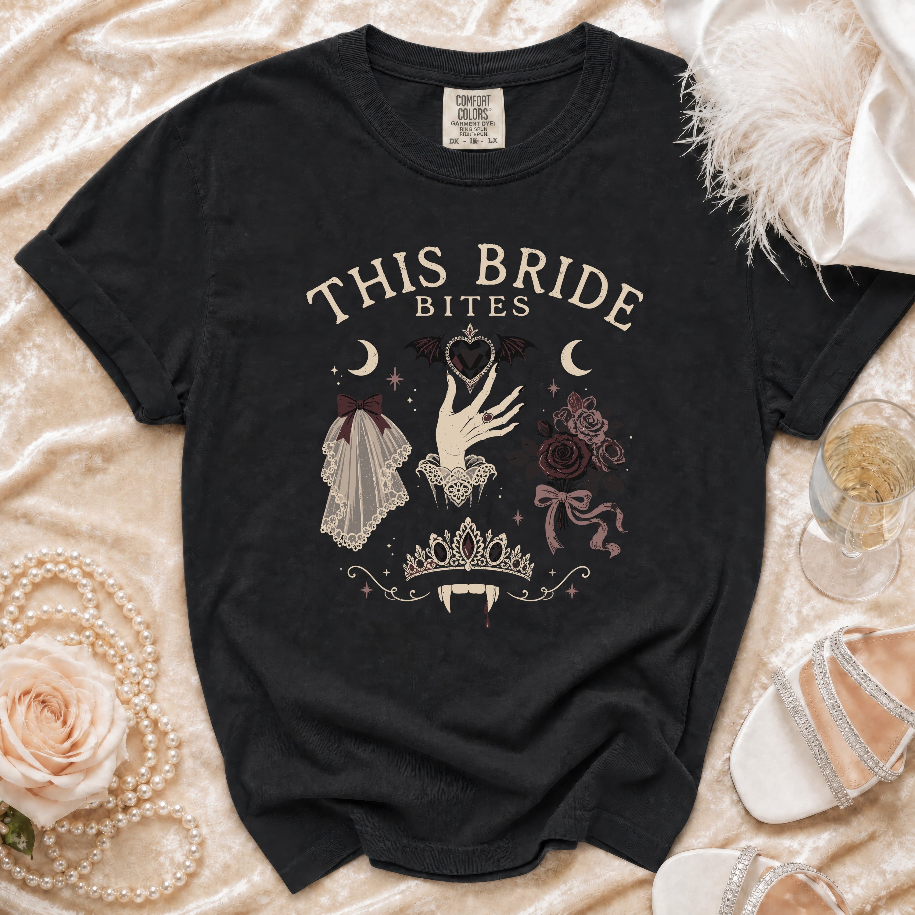 Black t-shirt with "This Bride Bites" design and vampire motifs.