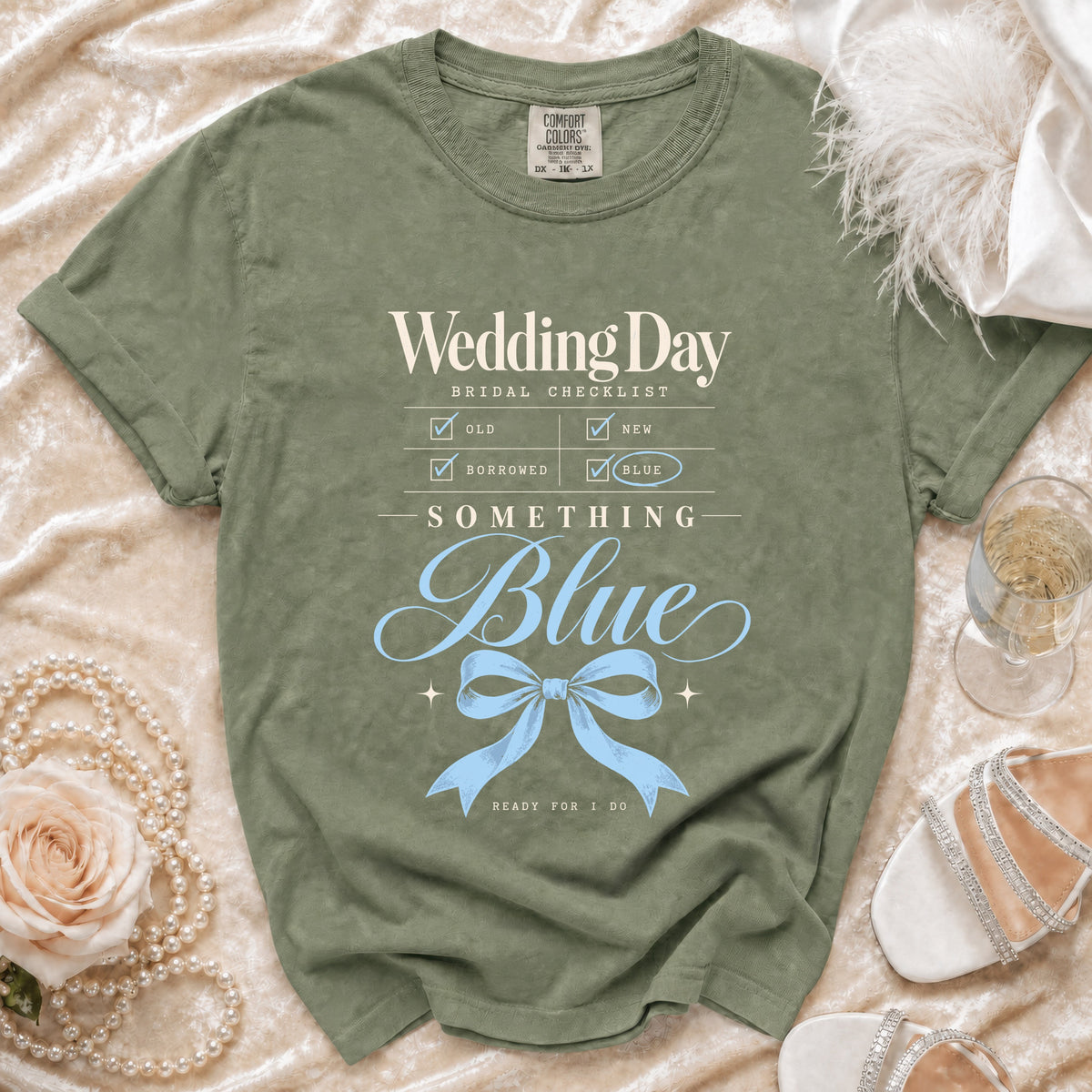 Olive green t-shirt with "Wedding Day Bridal Checklist" and "Something Blue" text.