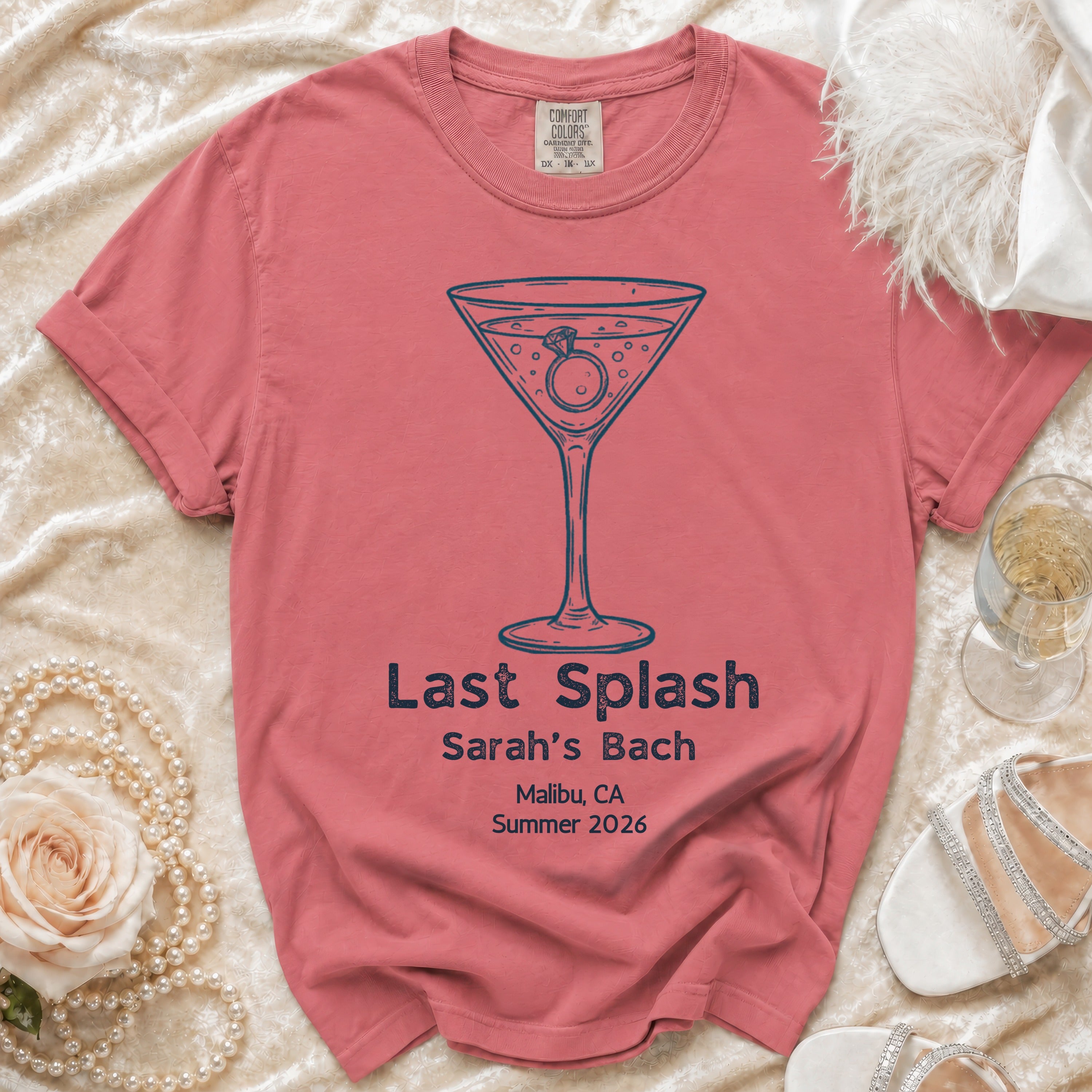 Coral t-shirt with "Last Splash Sarah's Bach" text and cocktail glass graphic.