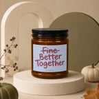 Amber jar candle with black lid and "Fine Better Together" text.