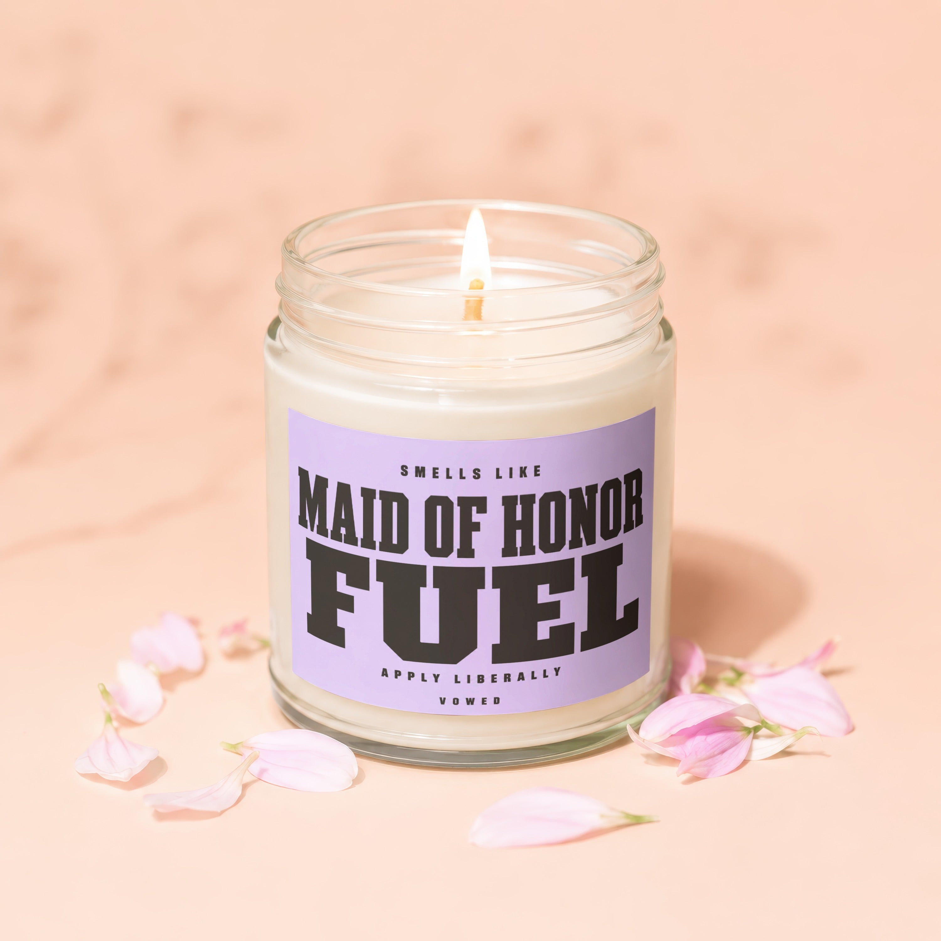 Lit candle in jar that reads "Maid of Honor Fuel" with "VOWED" below.