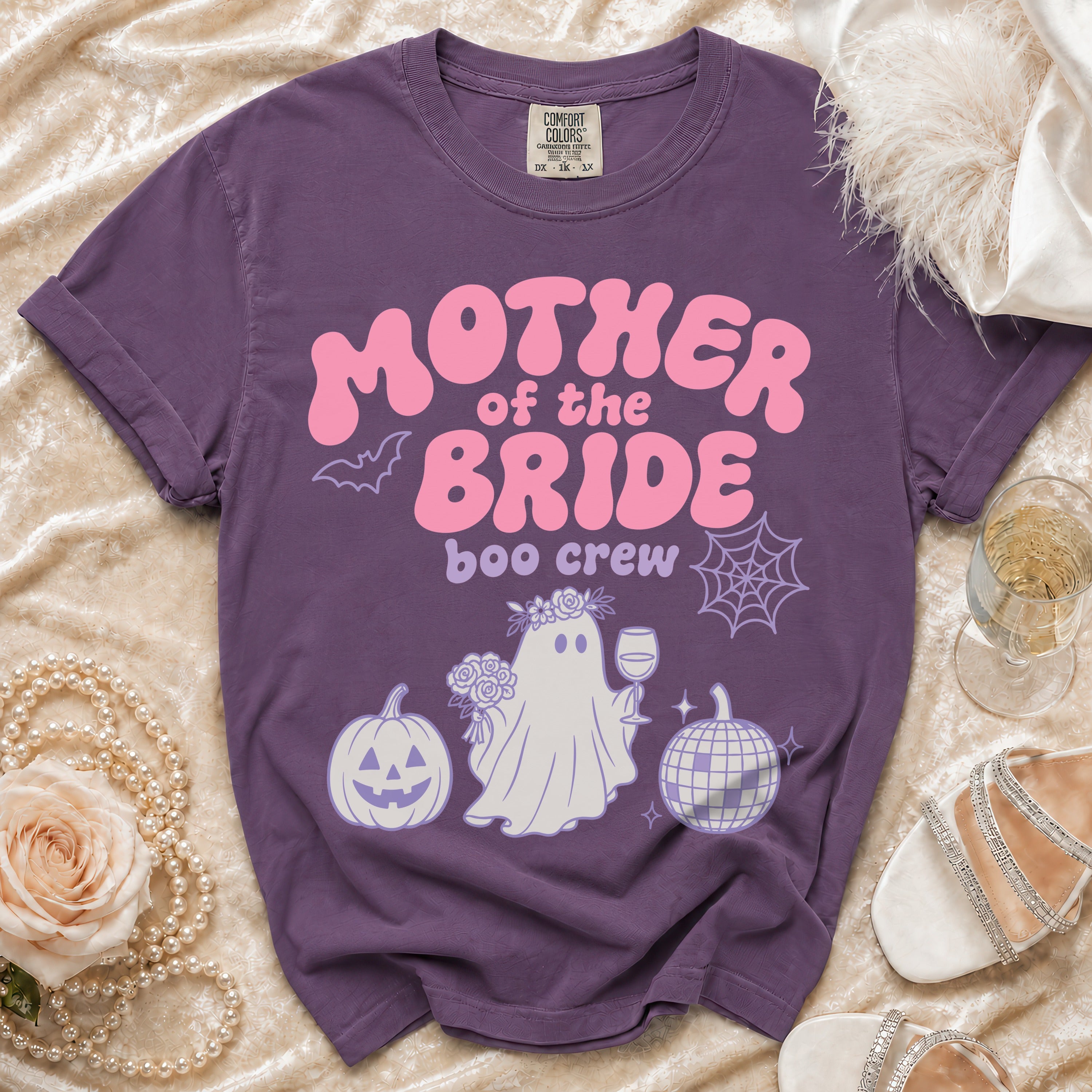 Purple t-shirt with "Mother of the Bride Boo Crew" text and ghost graphic.