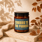Candle with text "Cheers to the Fiancés, they will be telling the story all night".