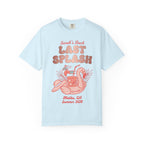 Light blue t-shirt with "Sarah's Last Splash" and a flamingo float.