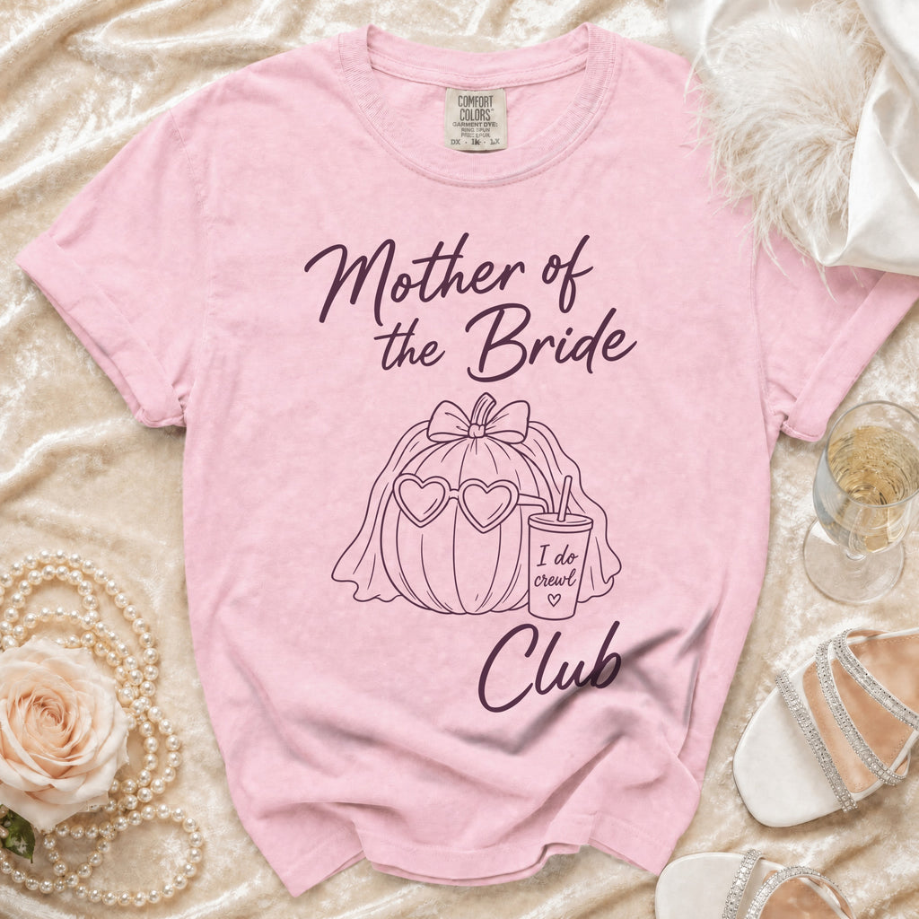 Pink t-shirt with "Mother of the Bride Club" text and pumpkin graphic.