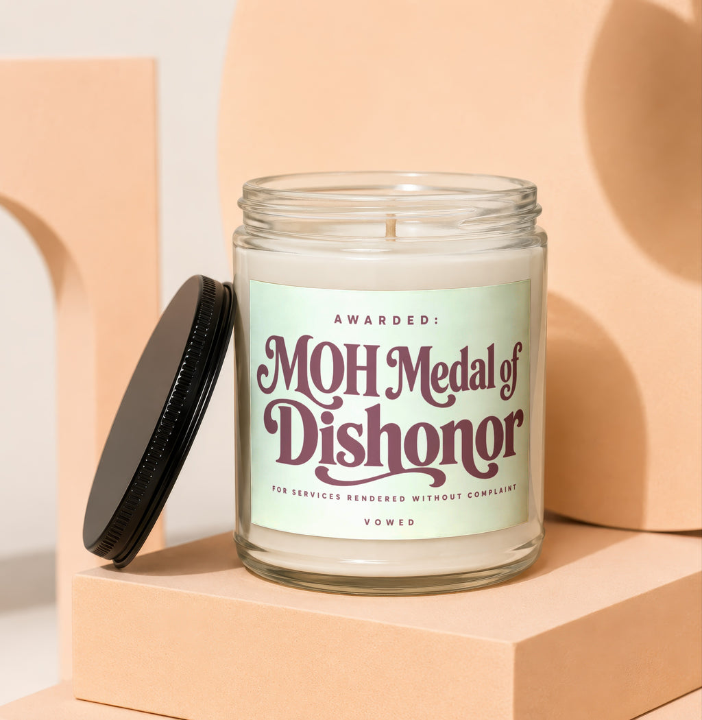 Candle with label "MOH Medal of Dishonor" for services rendered without complaint.